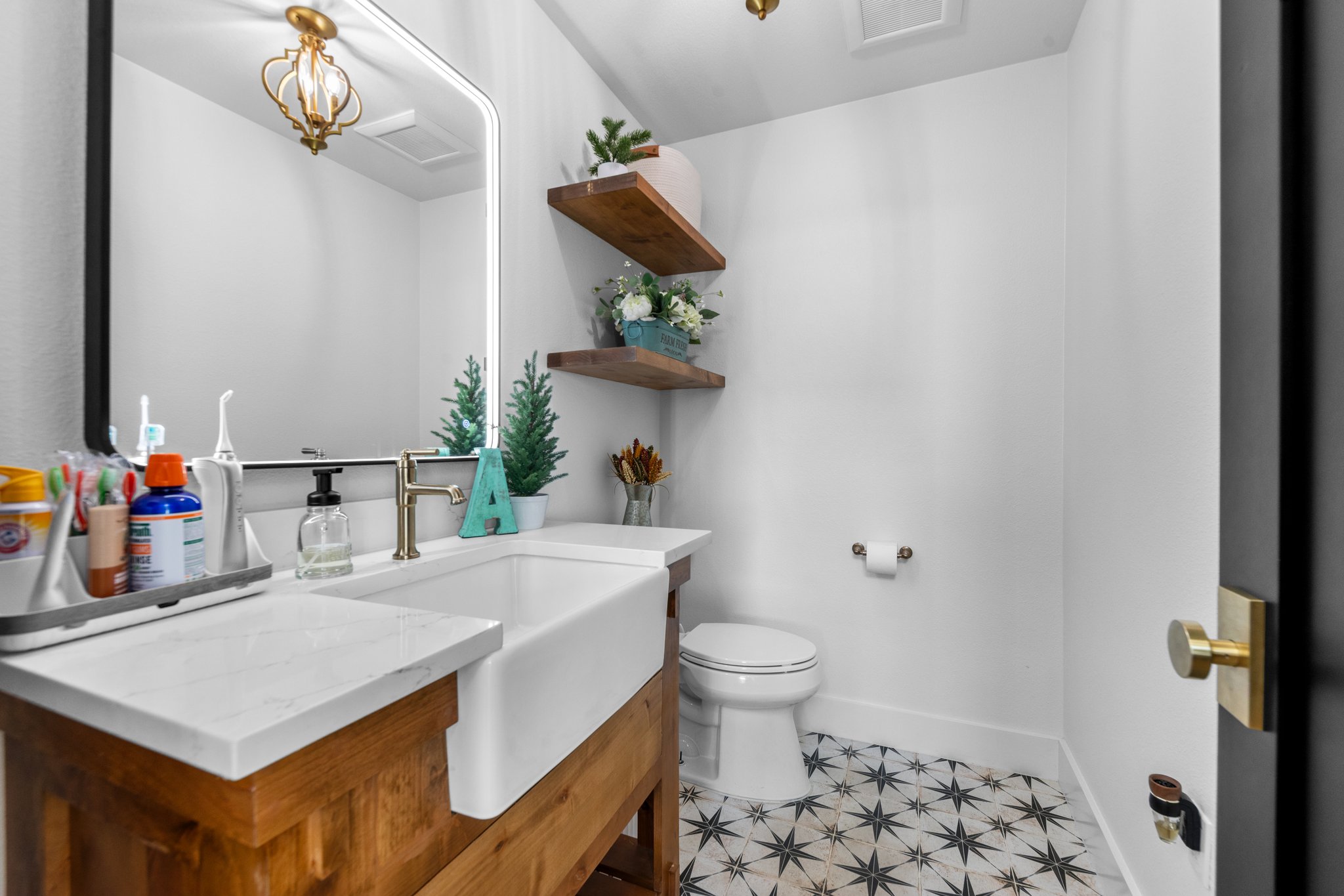1800 Diamond Ridge Drive Lampasas, TX 76550 - Photo 22 of 40 Half bath with toilet and vanity