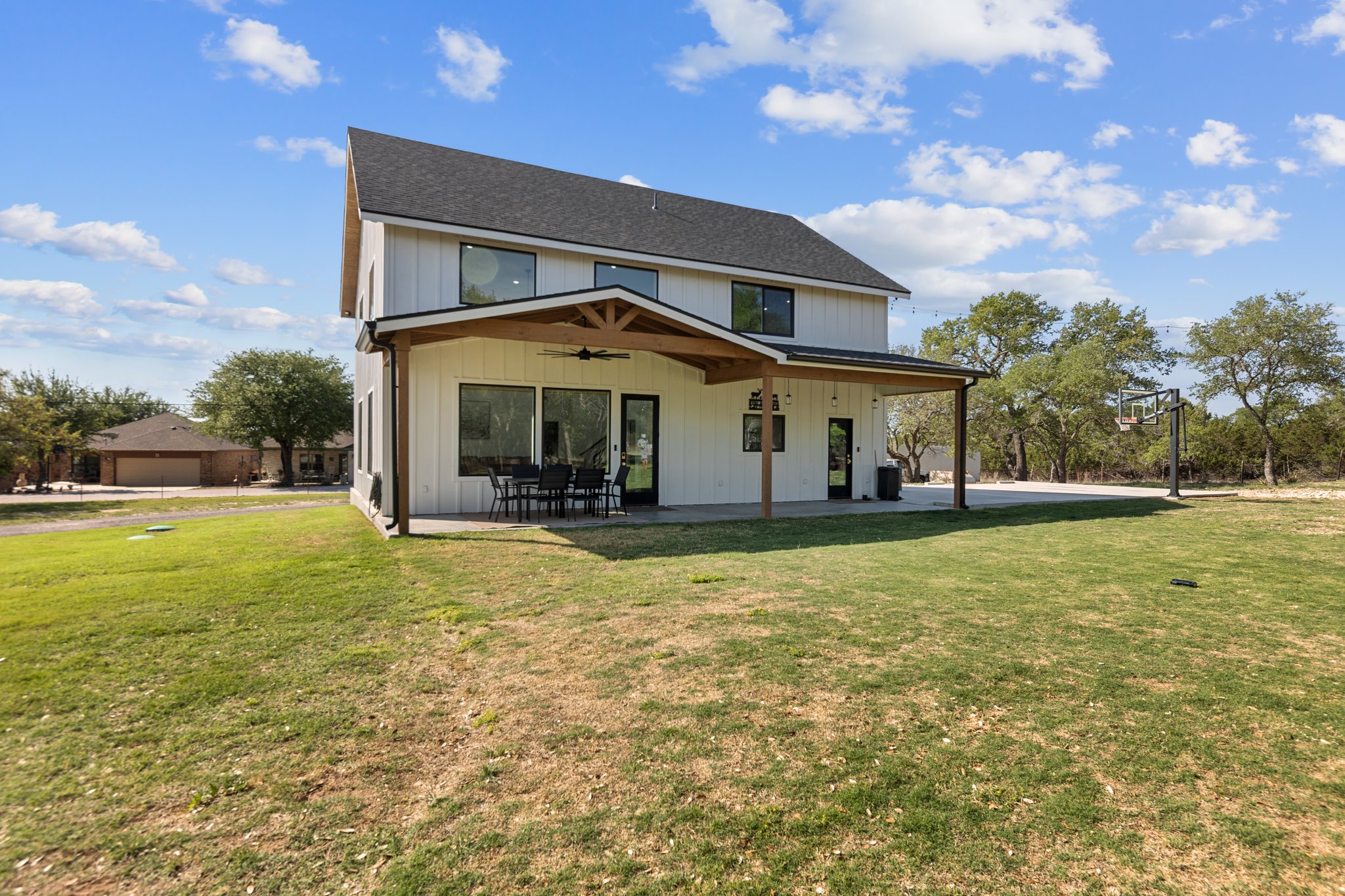 1800 Diamond Ridge Drive Lampasas, TX 76550 - Photo 32 of 40 Back of property featuring a ceiling fan, a yard, and a patio