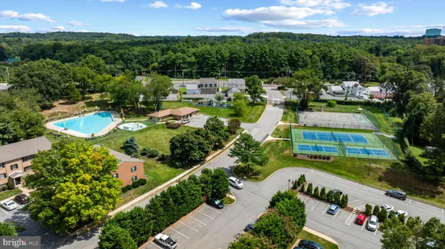 a view of a swimming pool with a garden