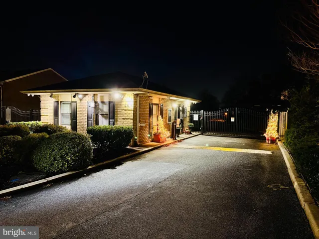 a view of a house with a street