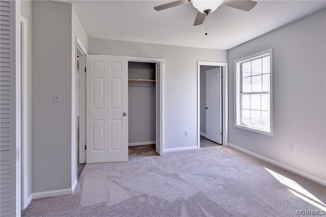 175 Racefield Drive Toano, VA 23168 - Photo 12 of 32 a view of an empty room with a window