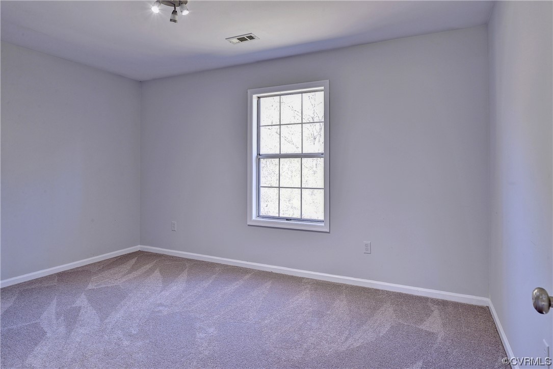 175 Racefield Drive Toano, VA 23168 - Photo 14 of 32 an empty room with a window