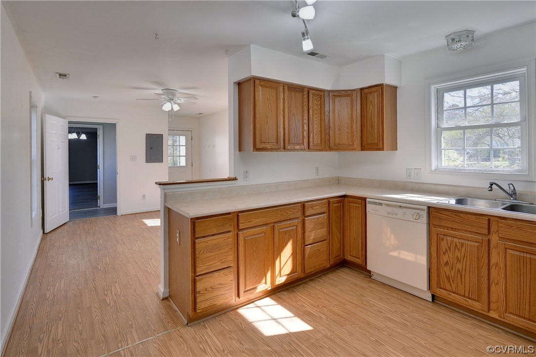 175 Racefield Drive Toano, VA 23168 - Photo 21 of 32 a kitchen with granite countertop a sink cabinets and window