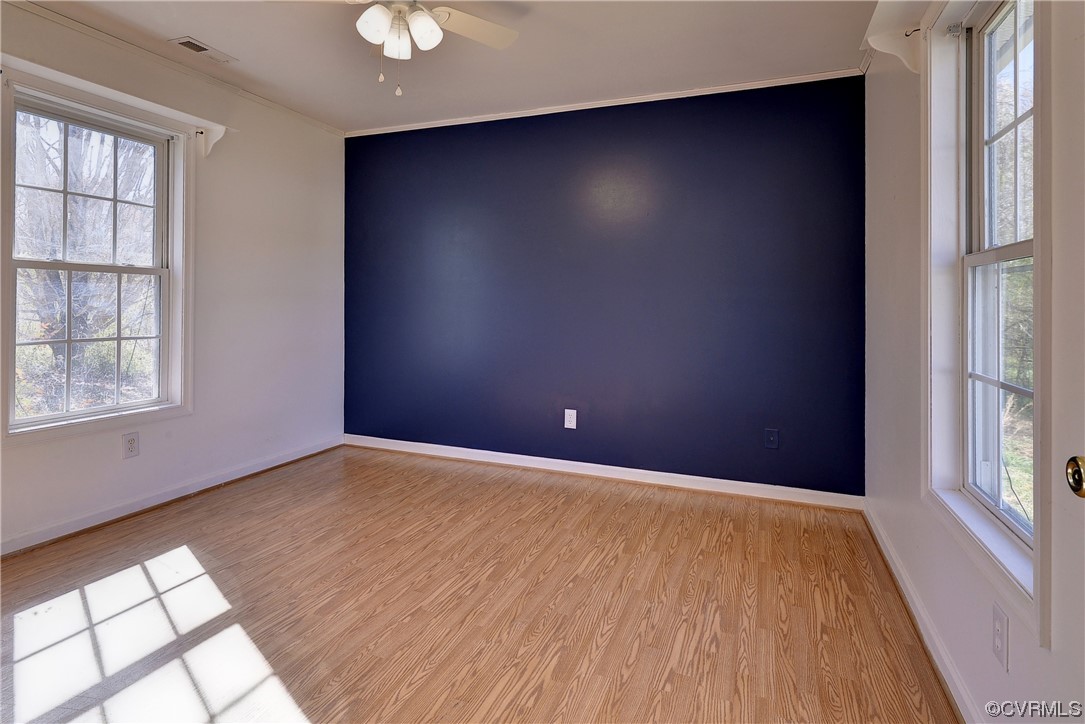 175 Racefield Drive Toano, VA 23168 - Photo 22 of 32 an empty room with windows and closet
