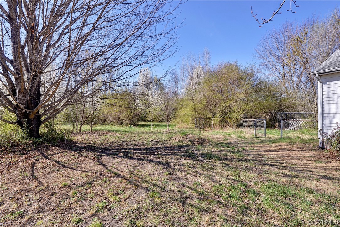 175 Racefield Drive Toano, VA 23168 - Photo 26 of 32 a view of a house with a yard