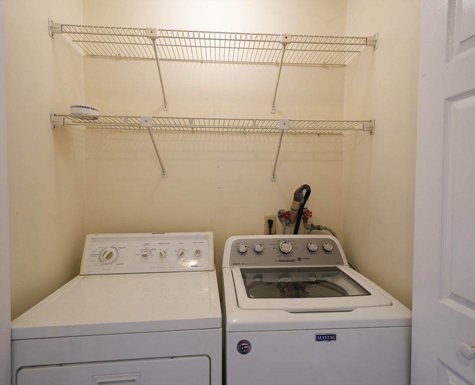 16 Winter Street, Unit 41A Waltham, MA 02451 - Photo 20 of 27 a utility room with dryer and washer