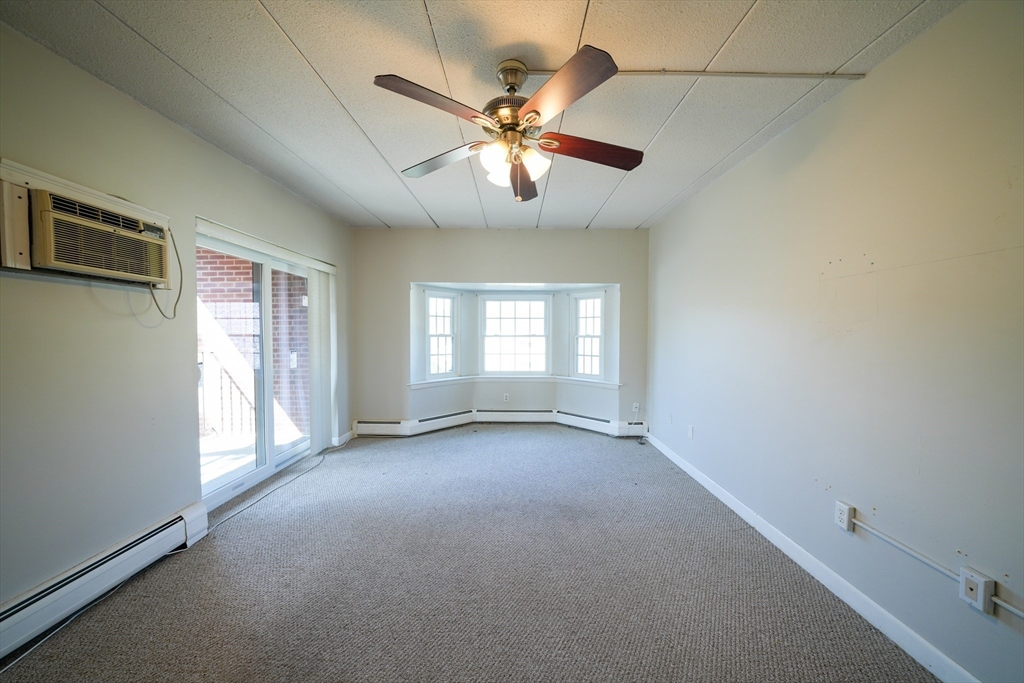 16 Winter Street, Unit 41A Waltham, MA 02451 - Photo 3 of 27 a view of an empty room with a window