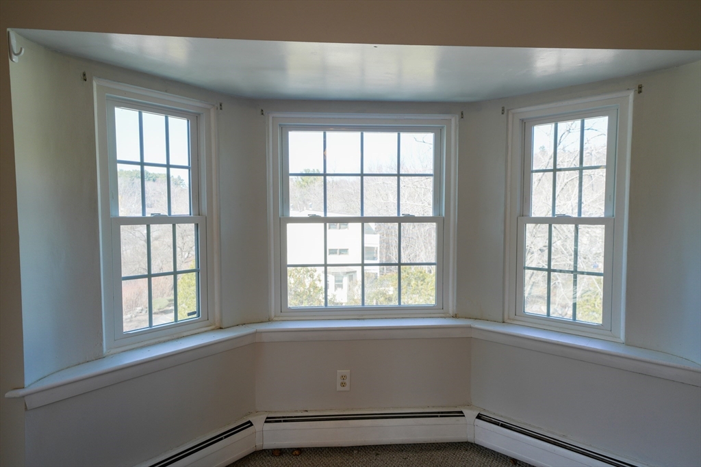 16 Winter Street, Unit 41A Waltham, MA 02451 - Photo 5 of 27 an empty room with a window