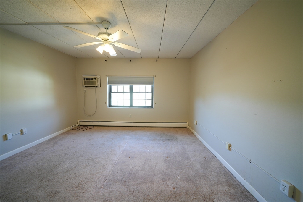 16 Winter Street, Unit 41A Waltham, MA 02451 - Photo 10 of 27 an empty room with a empty space and a window