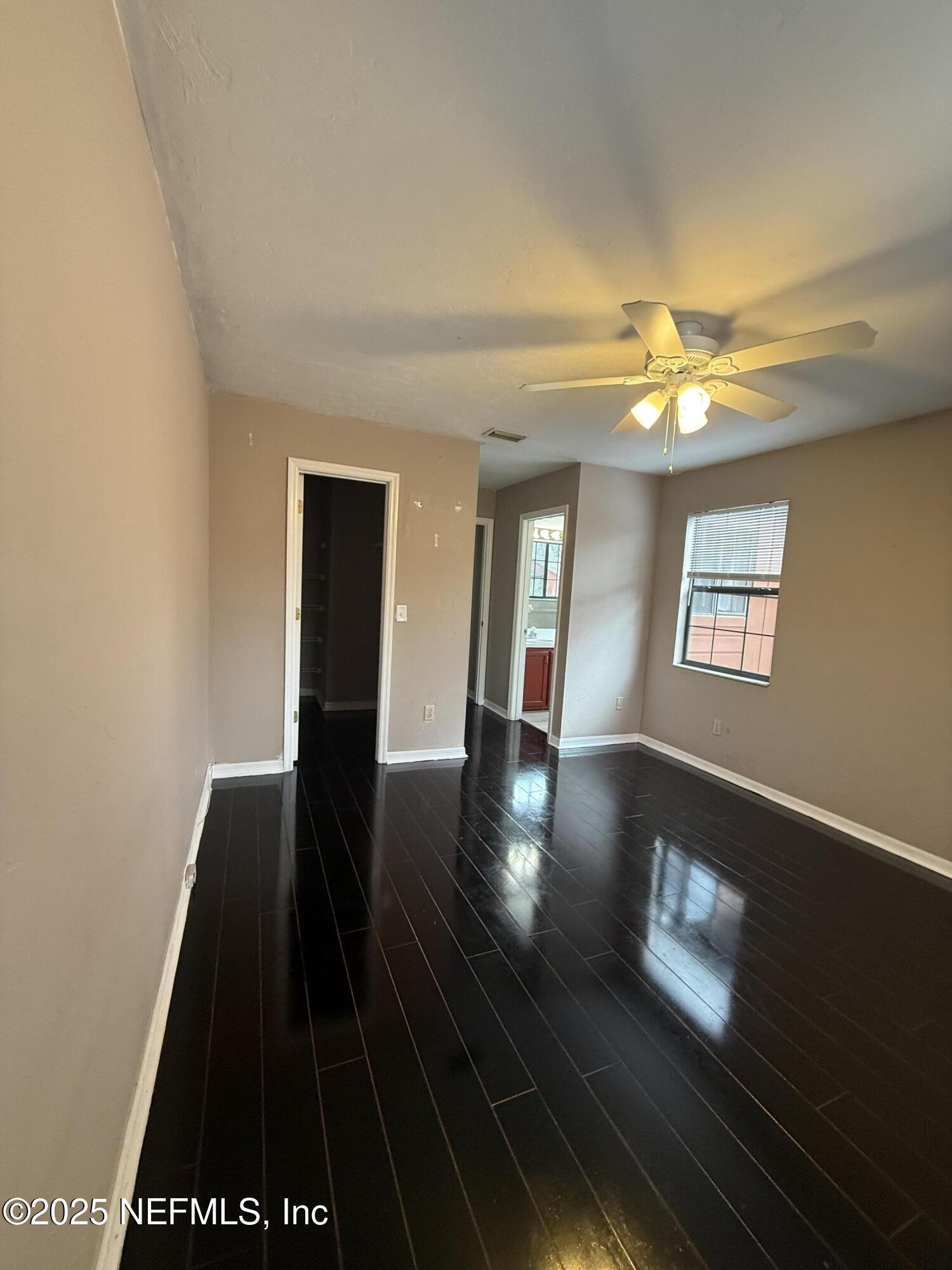 5864 Southwest 8th Place Gainesville, FL 32607 - Photo 4 of 8 a view of dinning room with wooden floor