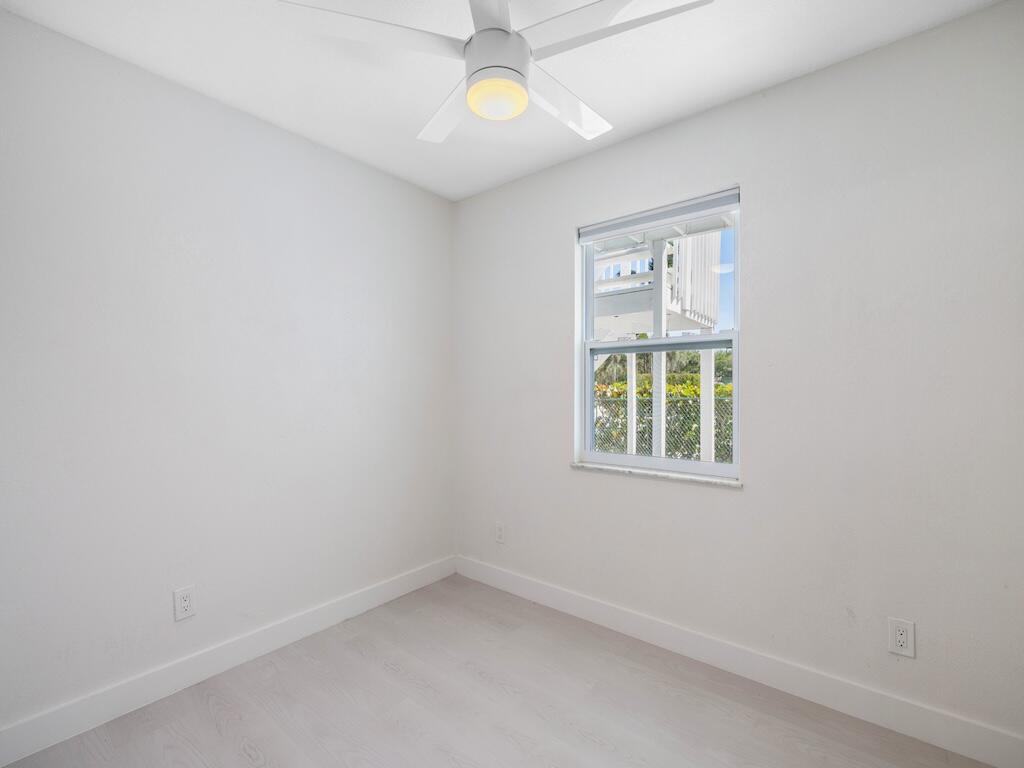 741 Hernando Street Fort Pierce, FL 34949 - Photo 38 of 65 an empty room with windows