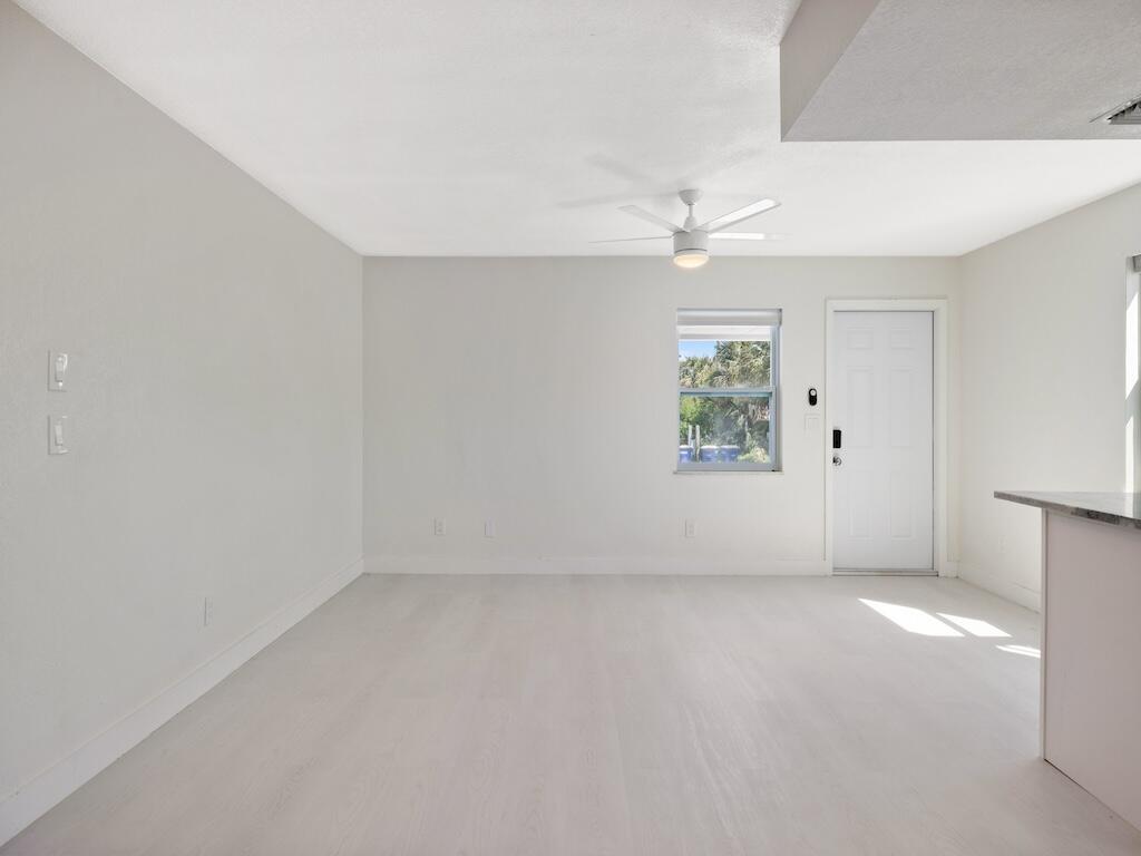 741 Hernando Street Fort Pierce, FL 34949 - Photo 44 of 65 a view of an empty room with a window