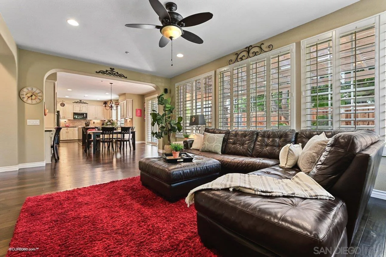 16658 Deer Ridge Road San Diego, CA 92127 - Photo 14 of 44 a living room with furniture and a large window