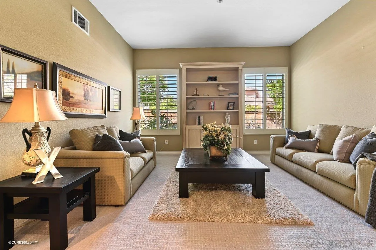 16658 Deer Ridge Road San Diego, CA 92127 - Photo 15 of 44 a living room with furniture and a large window