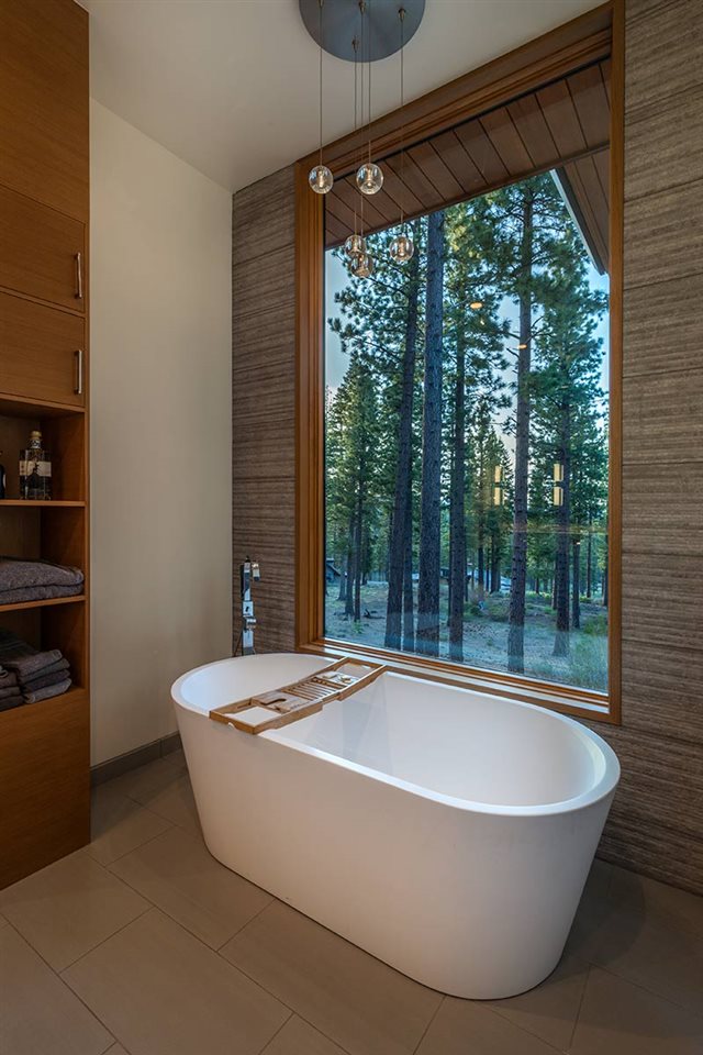 8237 Ehrman Drive Truckee, CA 96161 - Photo 11 of 21 a white bath tub sitting in a bathroom