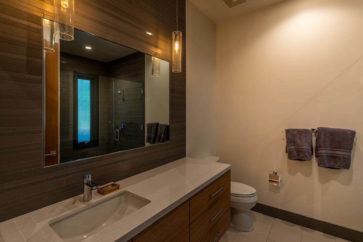 8237 Ehrman Drive Truckee, CA 96161 - Photo 16 of 21 a bathroom with a sink a toilet and mirror
