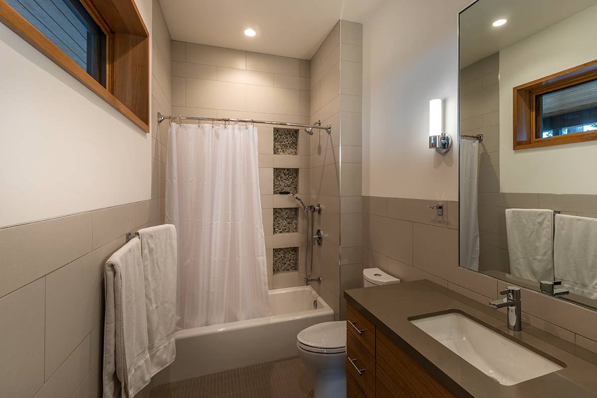 8237 Ehrman Drive Truckee, CA 96161 - Photo 18 of 21 a bathroom with a sink toilet and shower