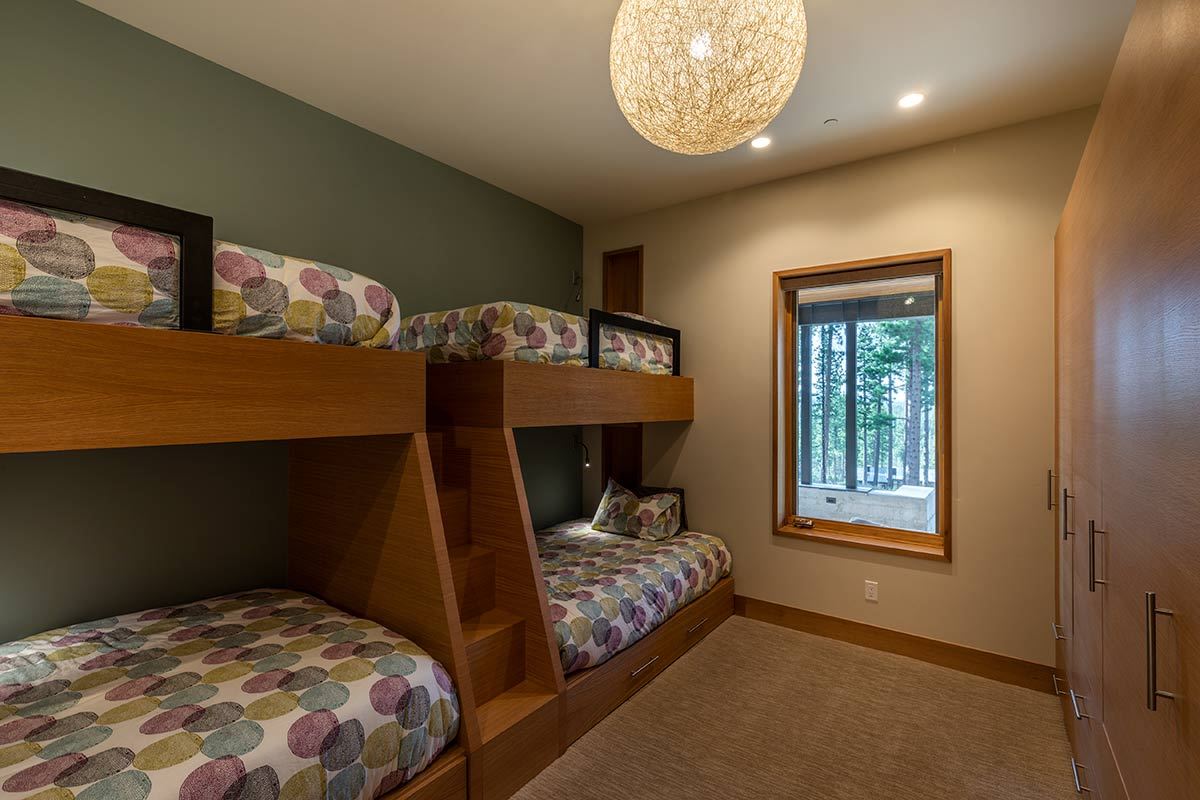 8237 Ehrman Drive Truckee, CA 96161 - Photo 19 of 21 a bedroom with a bed and window