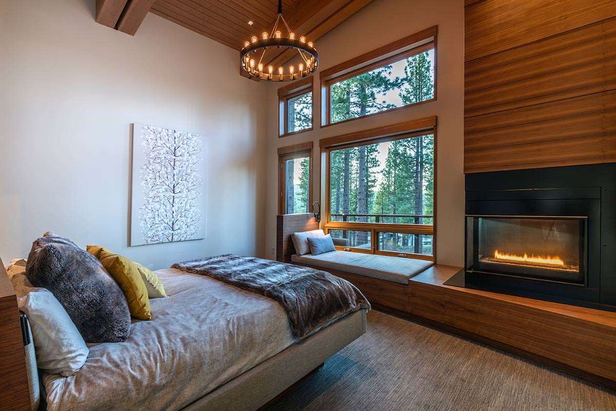 8237 Ehrman Drive Truckee, CA 96161 - Photo 10 of 21 a bedroom with a bed and a large window