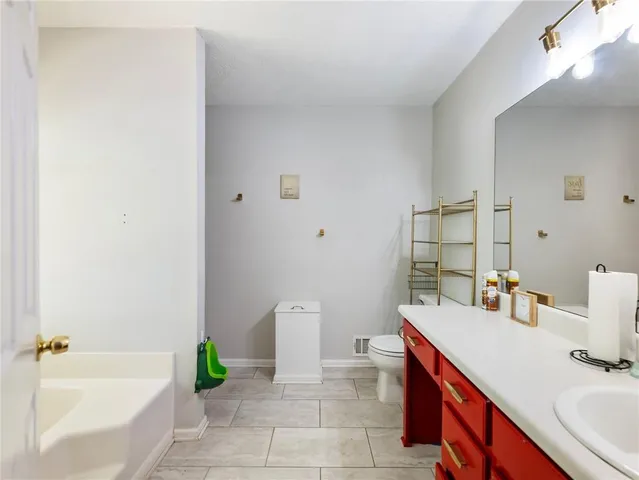a bathroom with a sink and a bathtub