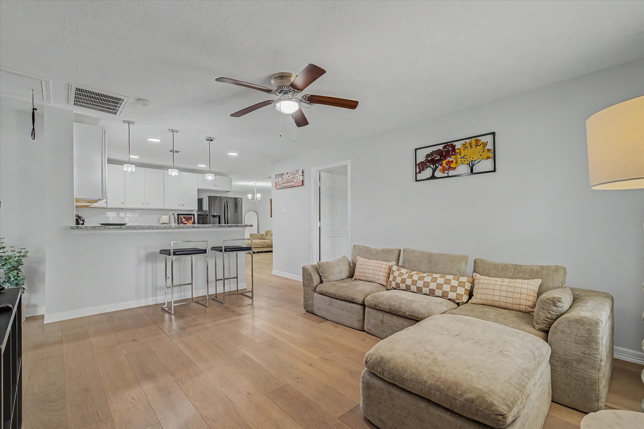 6834 New York Street Houston, TX 77021 - Photo 4 of 39 Bright and airy open-concept living space, perfect for relaxing or entertaining guests