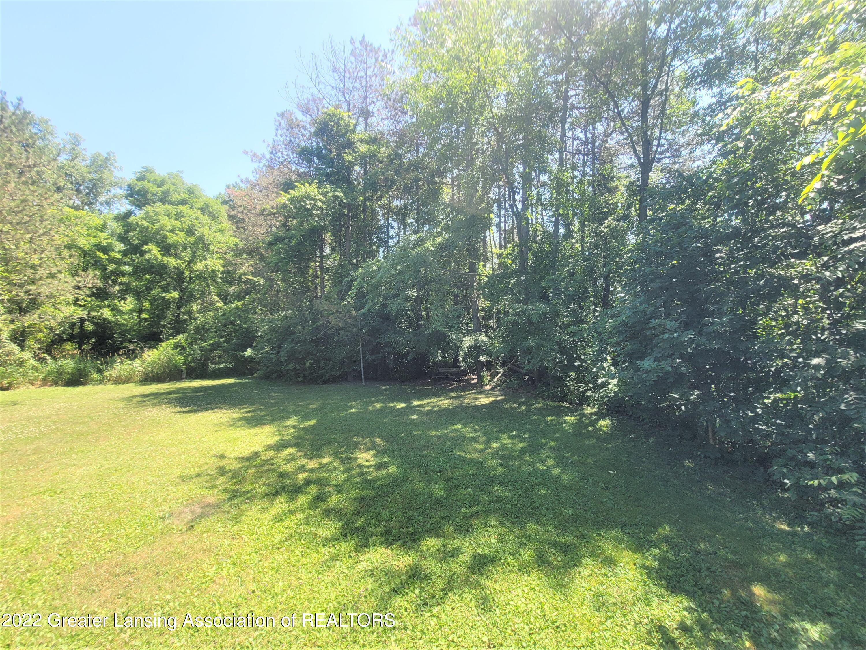 667 Lansing Road Morrice, MI 48857 - Photo 14 of 28 667 E Lansing Rd yard 2