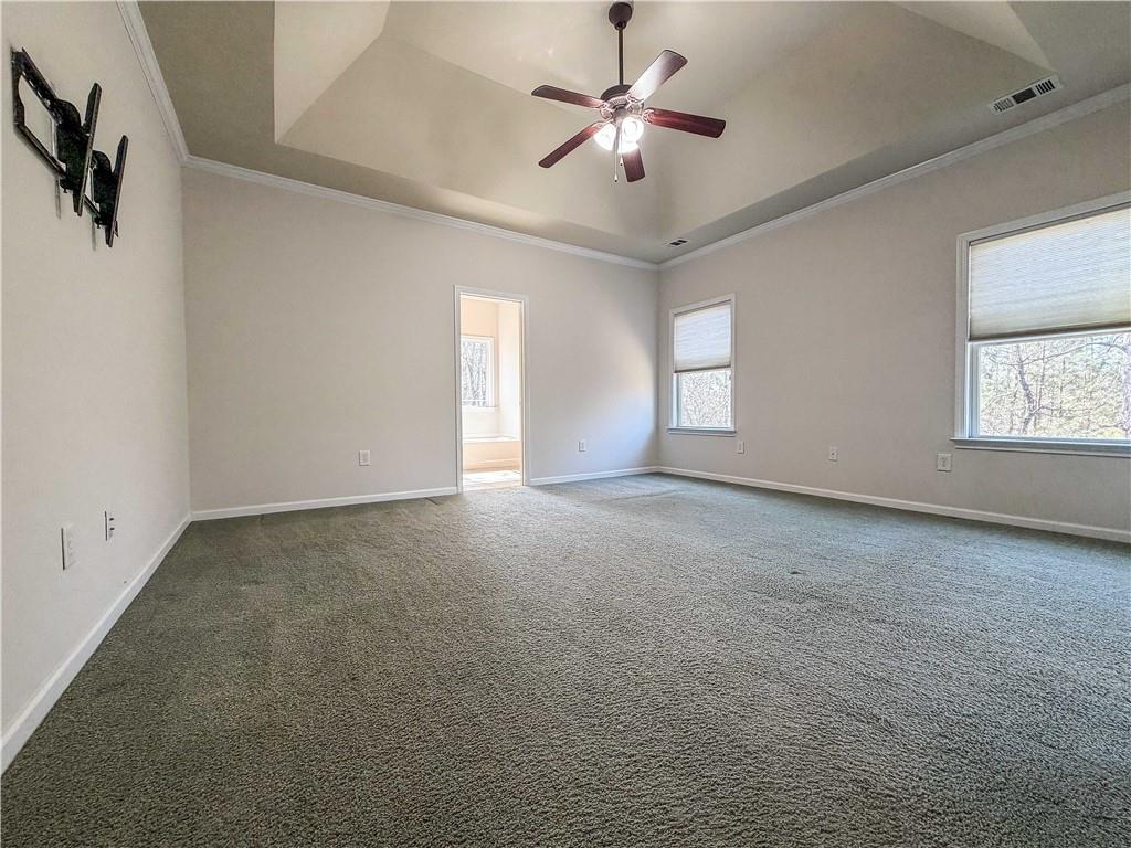 261 Potomac Drive Dallas, GA 30132 - Photo 31 of 76 wooden floor in an empty room with a window