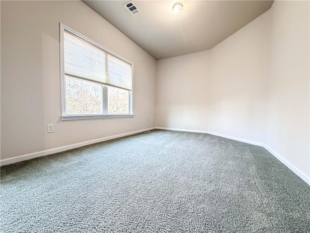 261 Potomac Drive Dallas, GA 30132 - Photo 32 of 76 an empty room with a window