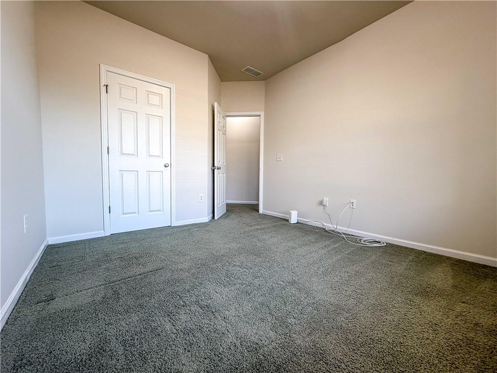 261 Potomac Drive Dallas, GA 30132 - Photo 39 of 76 an empty room with closet area