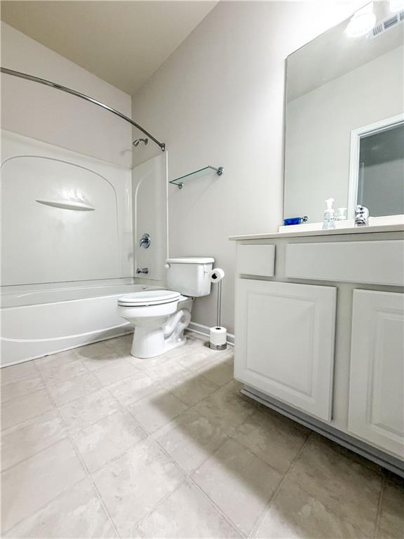 261 Potomac Drive Dallas, GA 30132 - Photo 41 of 76 a bathroom with a sink toilet and mirror