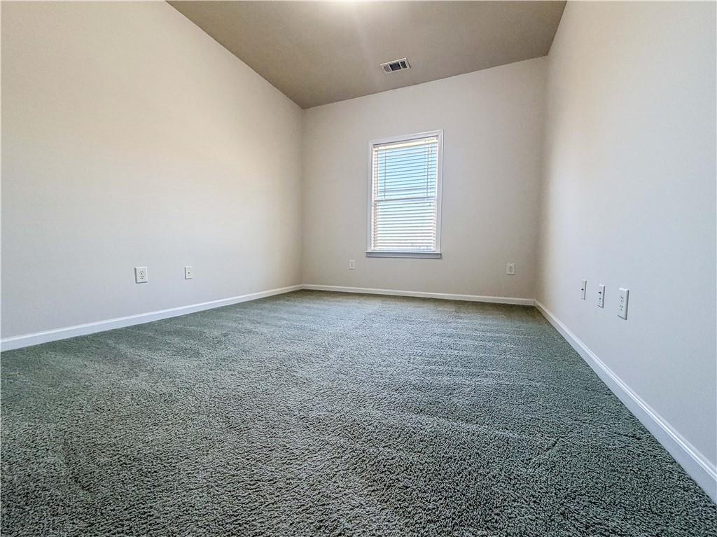 261 Potomac Drive Dallas, GA 30132 - Photo 44 of 76 an empty room with a window