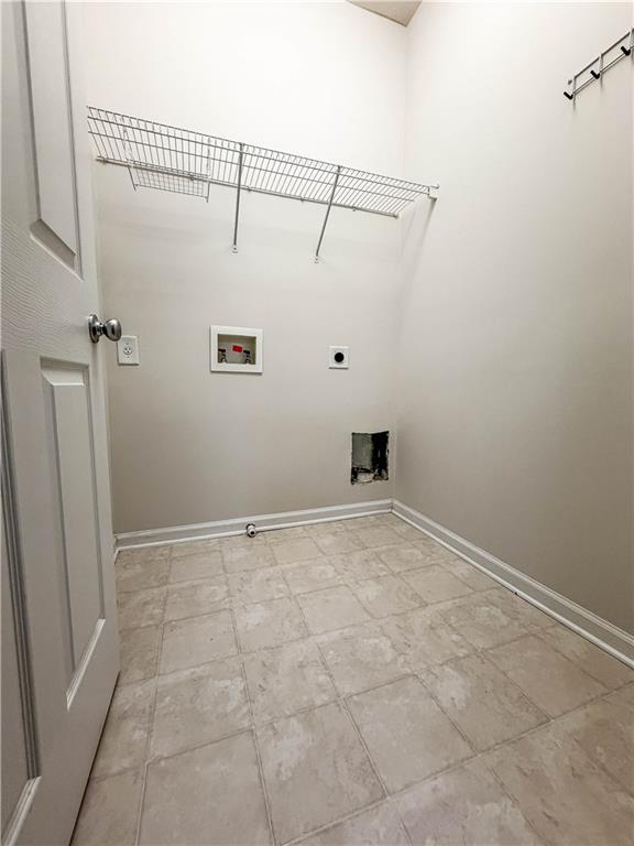 261 Potomac Drive Dallas, GA 30132 - Photo 45 of 76 a view of a room with racks on the wall