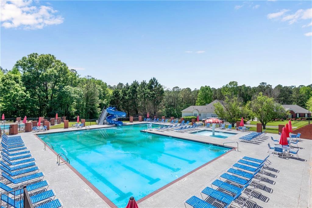 261 Potomac Drive Dallas, GA 30132 - Photo 71 of 76 a view of a backyard with swimming pool
