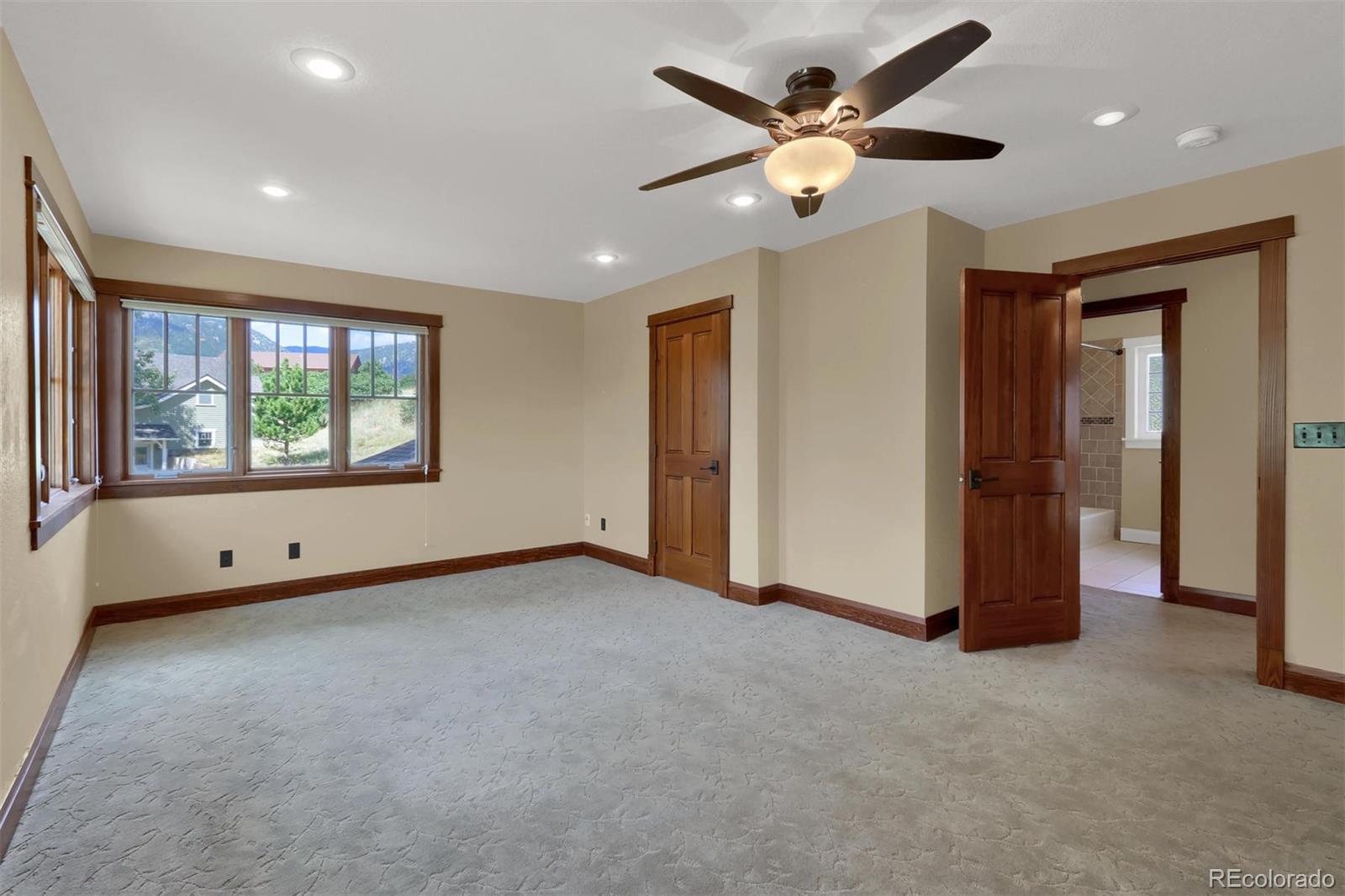 3045 Hay Creek Road Colorado Springs, CO 80921 - Photo 26 of 40 a view of an empty room with a window