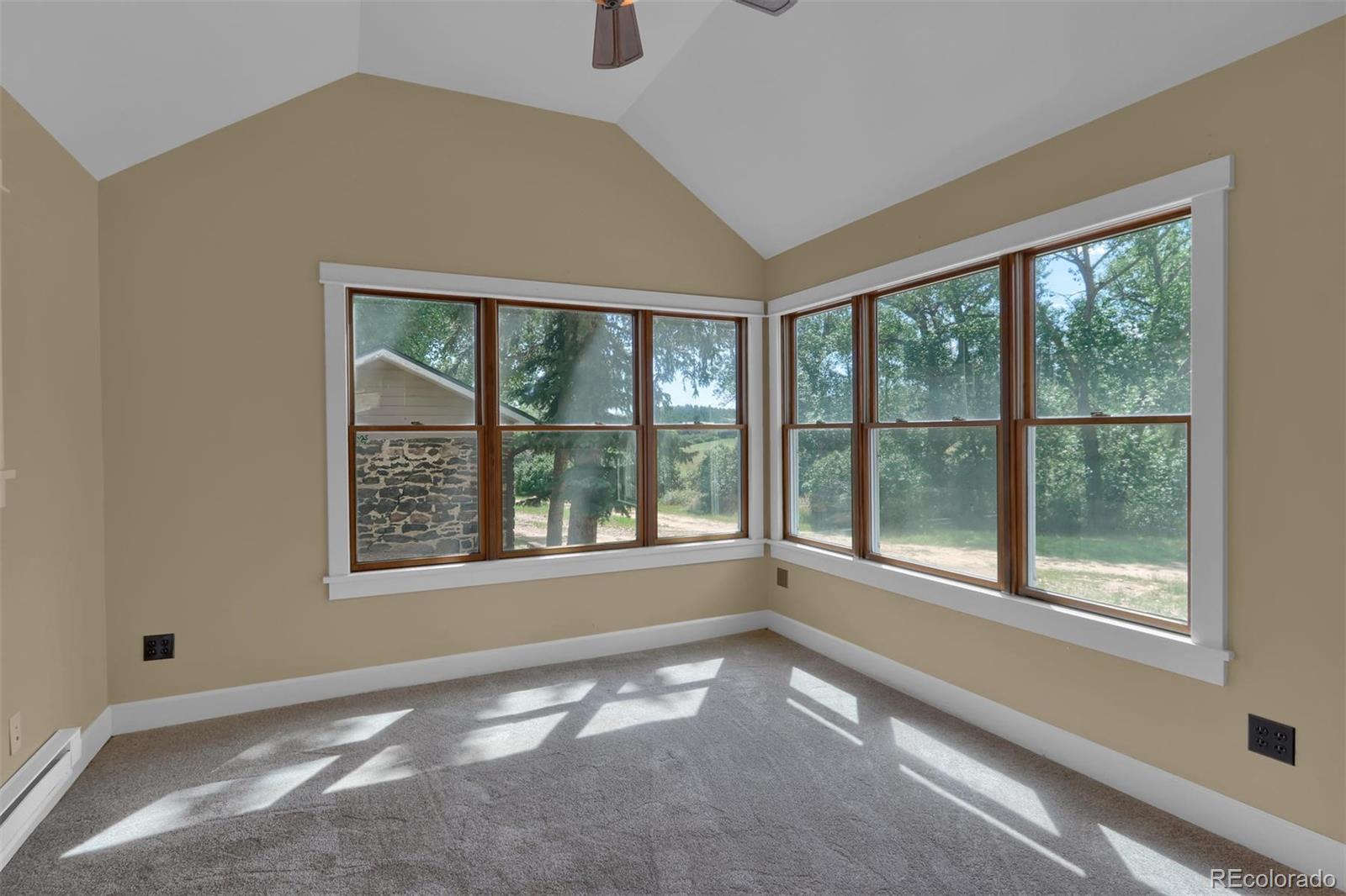 3045 Hay Creek Road Colorado Springs, CO 80921 - Photo 32 of 40 a view of an empty room with a window