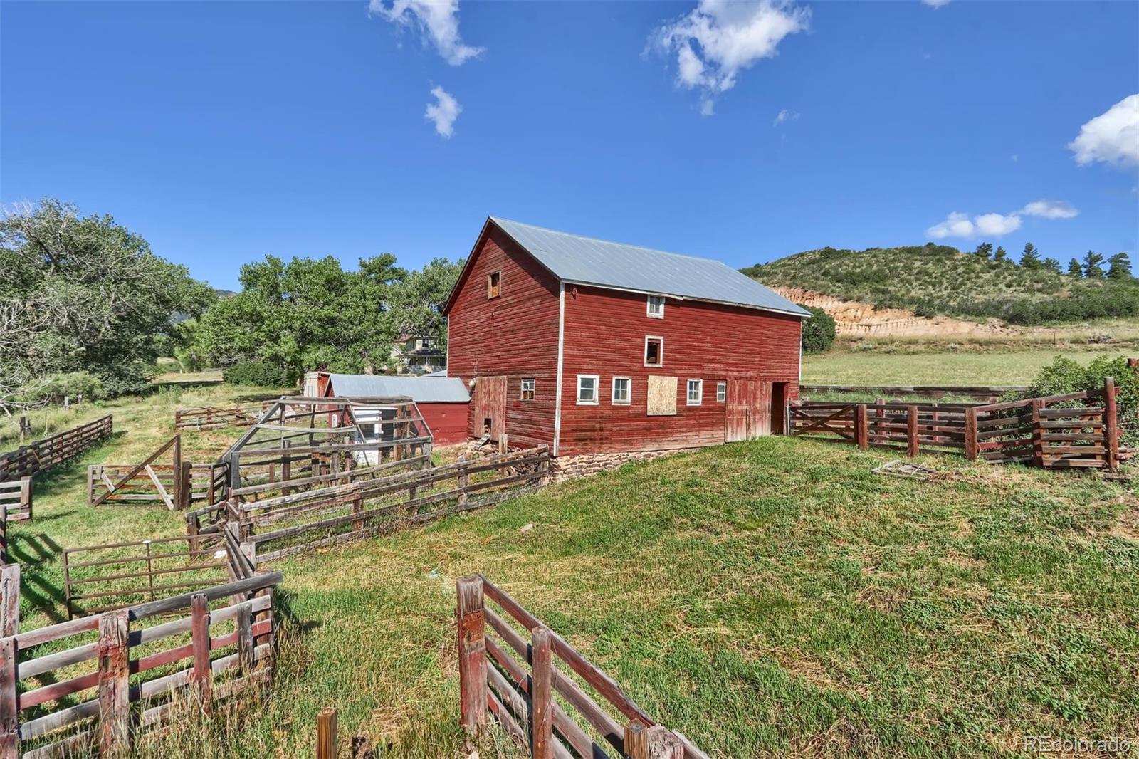 3045 Hay Creek Road Colorado Springs, CO 80921 - Photo 5 of 40 a view of a house with a yard