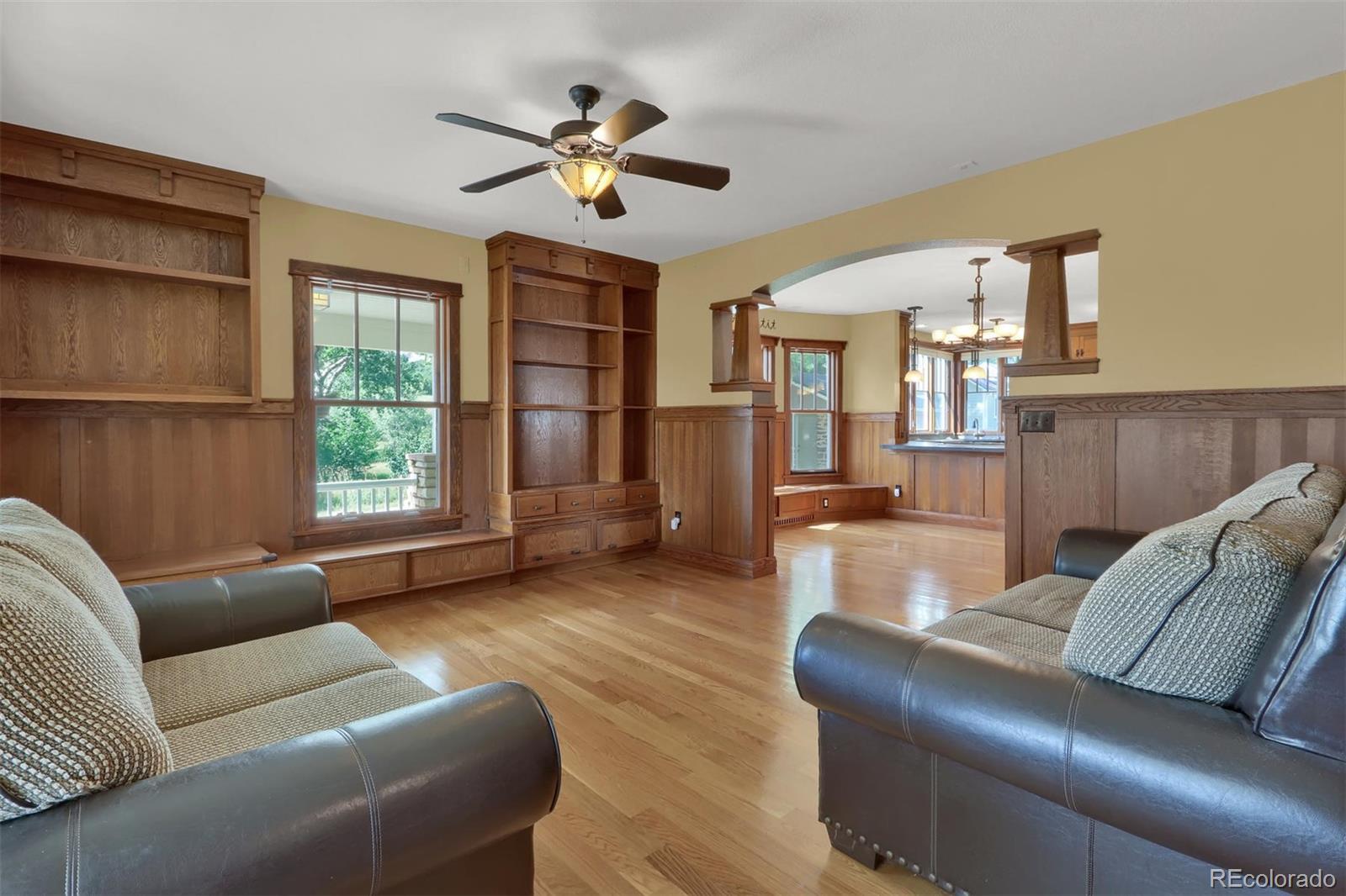 3045 Hay Creek Road Colorado Springs, CO 80921 - Photo 10 of 40 a living room with furniture and a large window