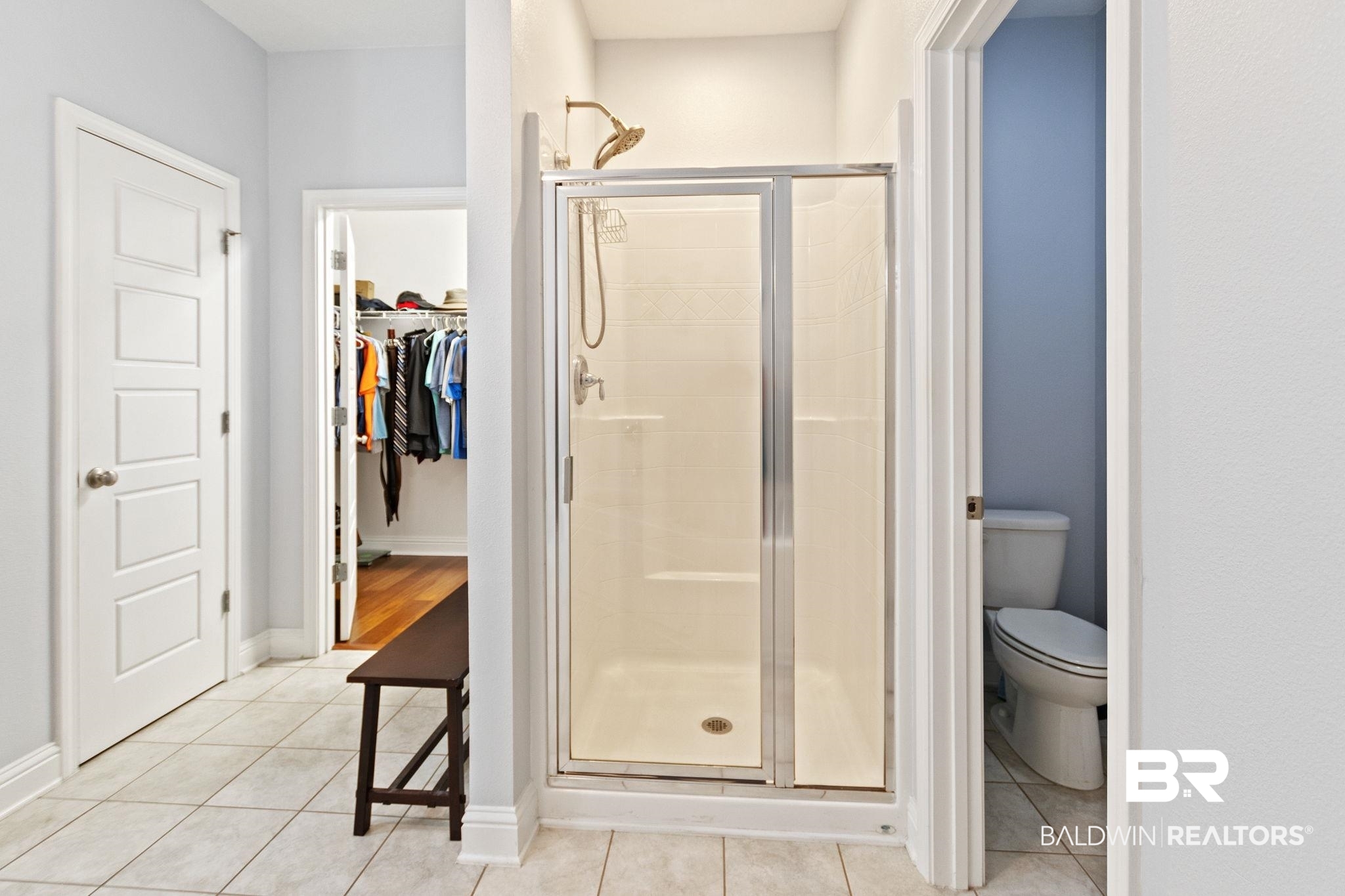 31541 Hoot Owl Road Daphne, AL 36527 - Photo 26 of 51 Bathroom with walk in shower, tile patterned flooring, and toilet