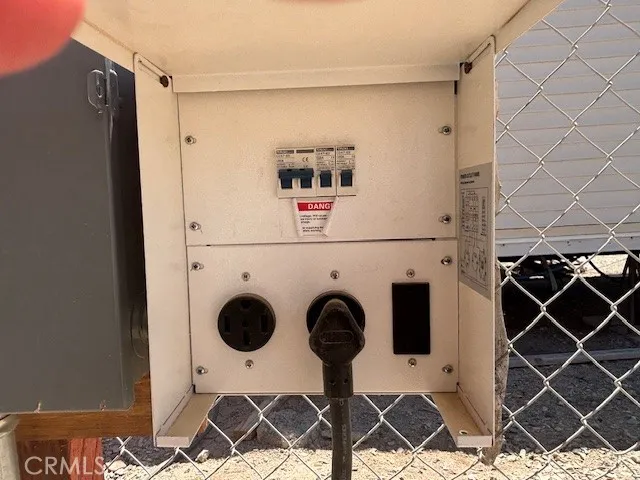 a cabinet with a rug and a table in it