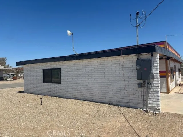 a view of a house with a street