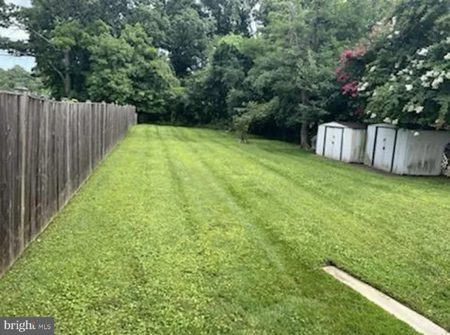 a house view with a backyard space