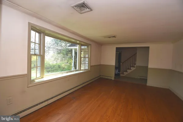 an empty room with windows