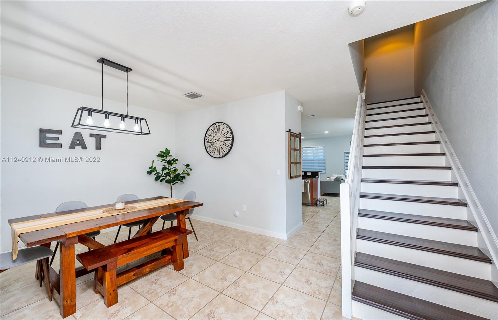 9031 Southwest 227th Street, Unit 9 Cutler Bay, FL 33190 - Photo 3 of 20 a view of entryway and hall