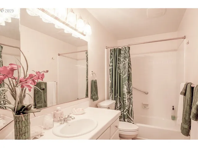 a utility room with closet dryer and washer