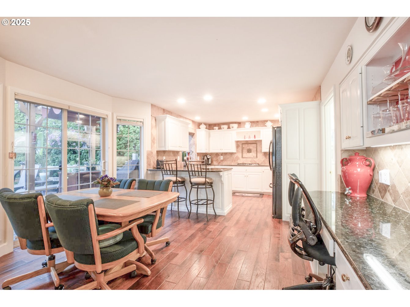 3152 Wolf Meadows Lane Eugene, OR 97408 - Photo 6 of 27 a dining room with furniture and wooden floor