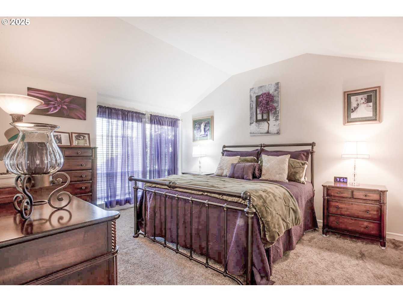 3152 Wolf Meadows Lane Eugene, OR 97408 - Photo 10 of 27 a bedroom with a bed and a tv on the dresser