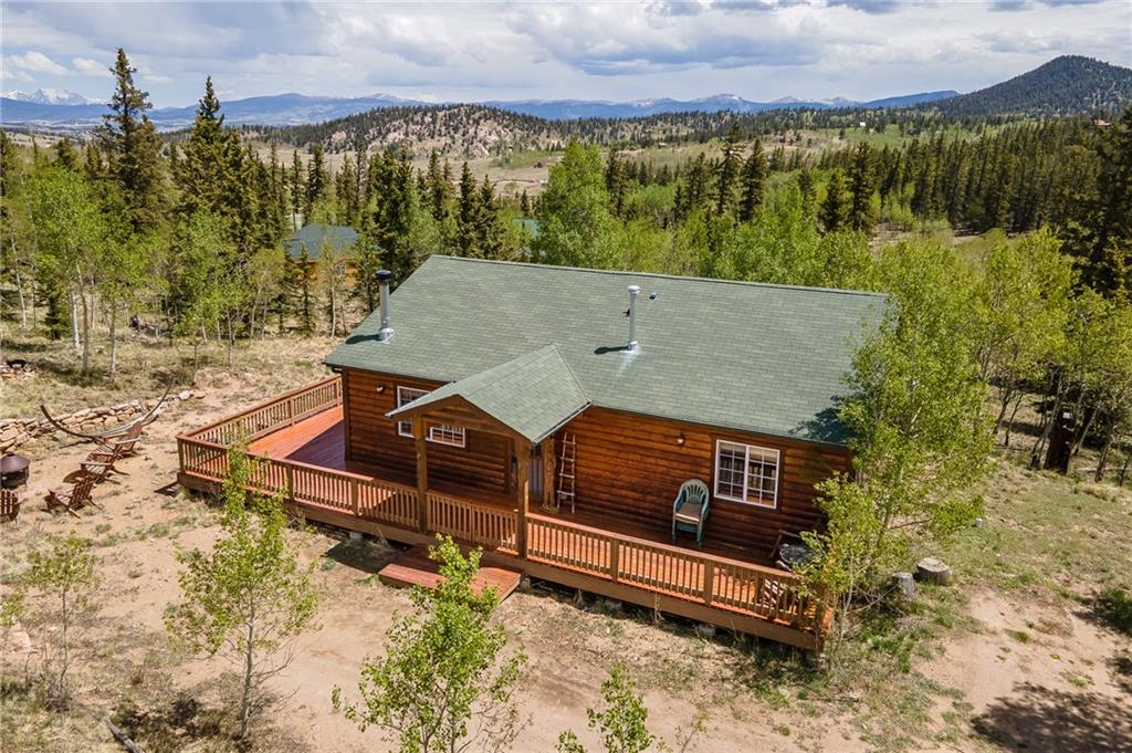 95 Ute Way Como, CO 80432 - Photo 1 of 27 an aerial view of a house with a yard