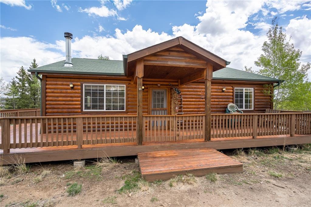95 Ute Way Como, CO 80432 - Photo 11 of 27 a front view of a house with a garden