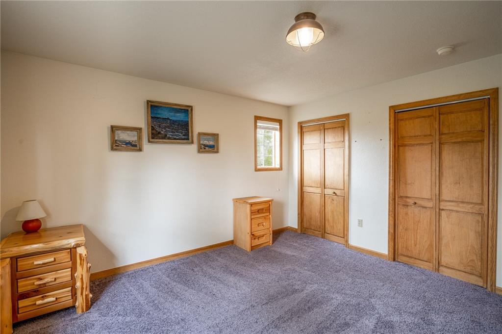 95 Ute Way Como, CO 80432 - Photo 13 of 27 a view of an empty room with a window