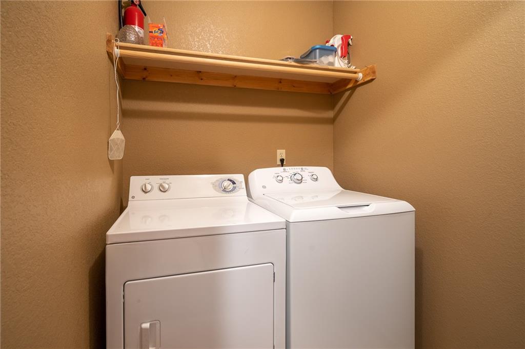 95 Ute Way Como, CO 80432 - Photo 20 of 27 a utility room with dryer and washer